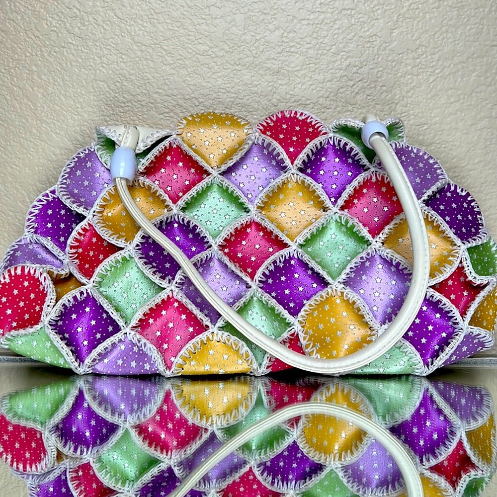 Super fun trendy multicolored handbag.